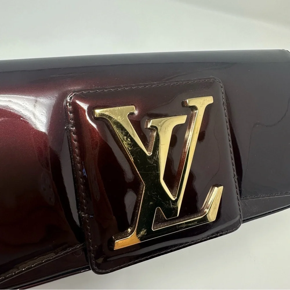 Louis Vuitton Dark Burgundy Clutch with Gold Logo